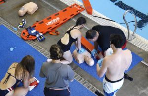 Lifeguards preparing for drills